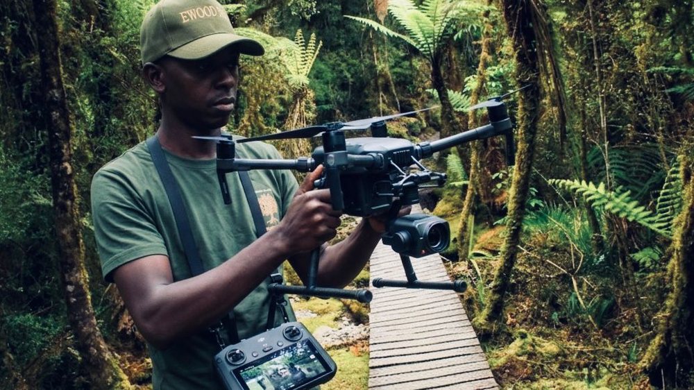 EWOOD field officer operating a survey drone in the forest